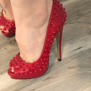Red spike opened toe pumps!